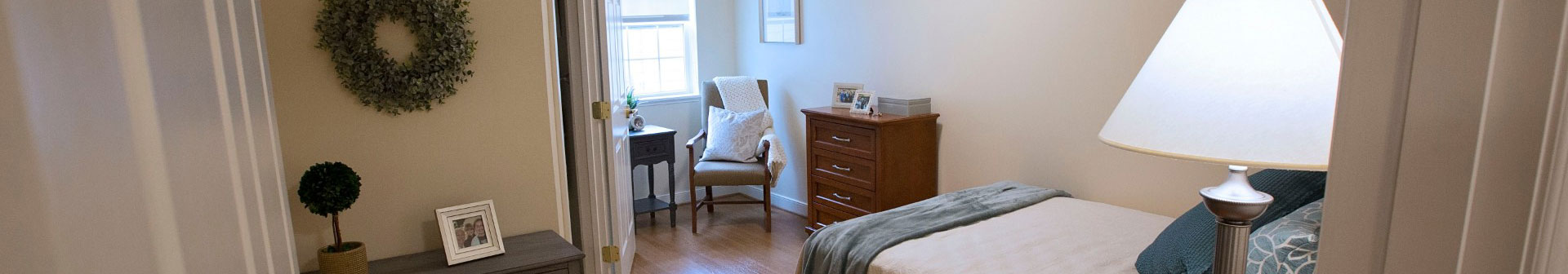 Senior living suite single bedroom with closet